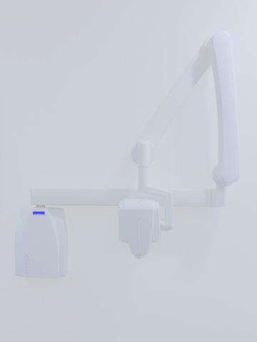High Key white image of a dental clinic Xray device