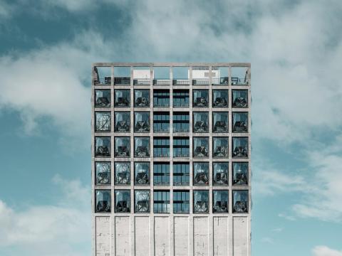 Tall building in the sky and clouds