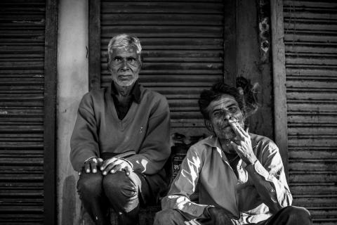 Two men sitting in India 
