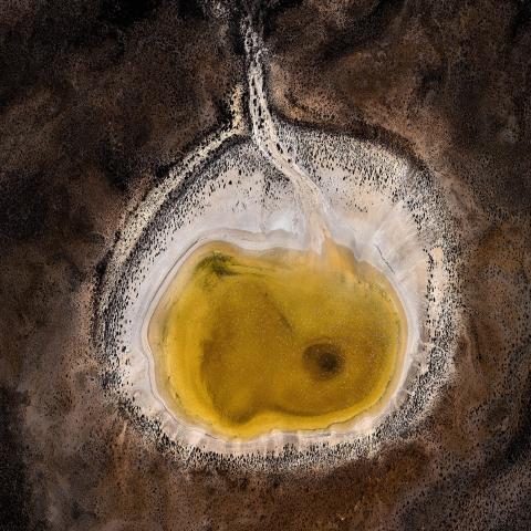 An aerial of a few small pools with coloured water found in Shark Bay