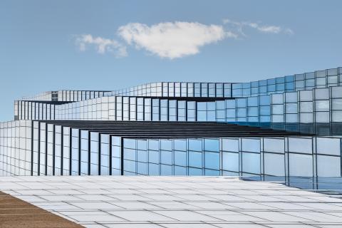 3 layers of building with reflective glass