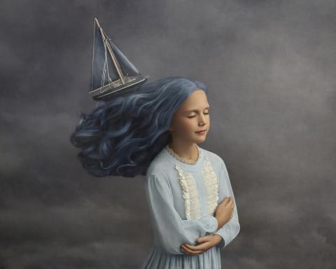 A girl with blue hair and a ship in the back of her hair