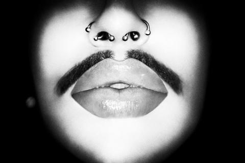Close up of a face with a mustache 